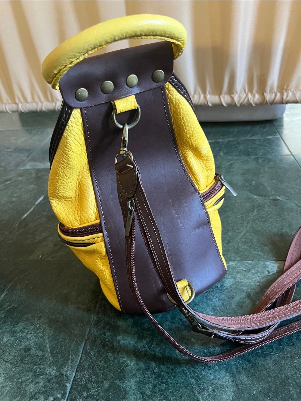 Yellow Leather Backpack with Dark Brown Trim and Top Handle